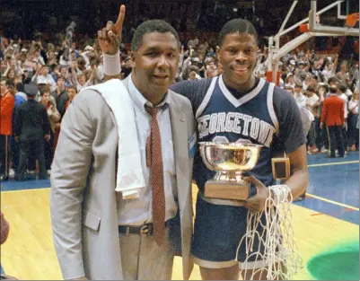  ?? The Associated Press ?? Coach John Thompson and Patrick Ewing, who together lifted Georgetown into the elite of college basketball, in 1985.