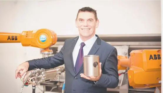  ?? ADVANCED TECHNOLOGY: Titomic CEO, Jeff Lang, with a titanium part created at CSIRO. ??