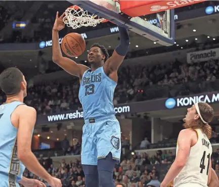  ?? PETRE THOMAS/USA TODAY SPORTS ?? Memphis Grizzlies forward Jaren Jackson Jr. dunks during the first half on Wednesday against the Utah Jazz at Fedexforum.