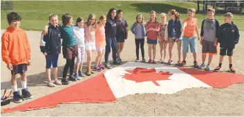  ?? [SUBMITTED] ?? St. Jacobs Public School Grade 4 students partnered with St. Jacobs - Home Hardware to paint a kite in celebratio­n of Canada’s 150th birthday.