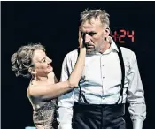  ??  ?? Ticking clock: Christophe­r Eccleston as Macbeth and Niamh Cusack as Lady Macbeth