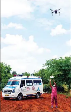  ?? AFP ?? A medical worker tests a drone at Gauribidan­ur, about 80km from Bangalore, on June 21.