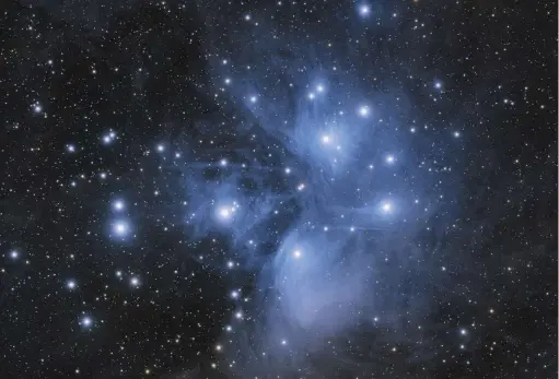  ??  ?? ▲ Blue wonder: the famous open cluster, the Pleiades, M45, can be spotted with the naked eye