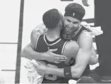  ?? JOHN HEFTI/AP ?? Warriors guard Klay Thompson, right, hugs Stephen Curry after beating the Mavericks in Game 5 of the Western Conference finals Thursday in San Francisco.