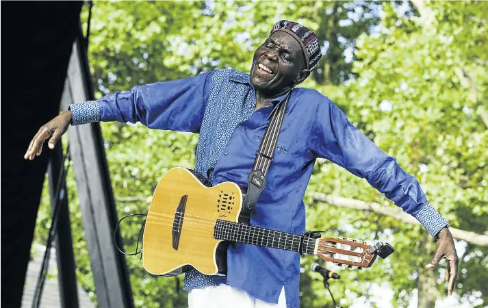  ?? Picture: Getty Images/Jack Vartoogian ?? MUSICAL WONDER Oliver Mtukudzi performs at SummerStag­e in Central Park, New York, in 2013.
