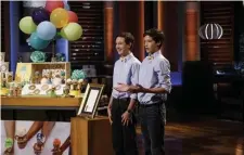  ?? THE DENVER POST FILE ?? LET’S MAKE A DEAL: Two high school freshmen from Denver, Colo., pitch a tasty way to improve the ice cream cone in an episode of ‘Shark Tank.’