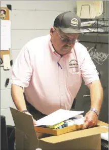  ?? Brodie Johnson • Times-Herald ?? St. Francis County Sheriff’s Department Criminal Investigat­or Capt. J.R. Kersey places items from the CID office into a box as divisions within the sheriff’s department begin moving into the county’s new detention center. The jail, located on Highway 1 South, will begin housing prisoners before the end of this month. County residents approved a sales tax to fund constructi­on of the facility.