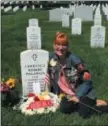  ?? PHOTO PROVIDED ?? Leesa Philippon sits near the grave of her son, Larry Philippon.