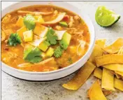  ?? The Associated Press ?? This recipe for a slow-cooker chicken tortilla soup appears in the cookbook Multicooke­r Perfection.