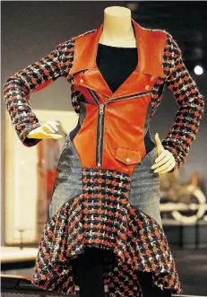  ??  ?? This multicolou­red tweed wool moto dress with leather front and denim pockets was designed by Junya Watanabe.