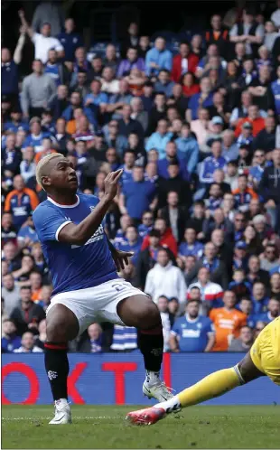  ?? ?? Alfredo Morelos hits the back of the net after Antonio Colak (below) opened the scoring at Ibrox with his first Rangers goal