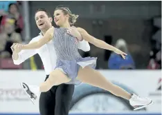  ?? SUPPLIED PHOTO ?? St. Catharines native Kirsten Moore-Towers, foreground, with pairs partner Michael Marinaro competing at Skate America in Lake Placid, N.Y., in this November 2017 file photo, is returning to the Winter Olympics.