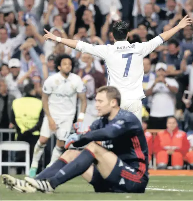  ?? PICTURE: REUTERS ?? WIZARD: Real Madrid’s Cristiano Ronaldo celebrates scoring their third goal and completing his hat-trick against Bayern Munich in the Uefa Champions League quarter-final second leg match at the Estadio Santiago Bernabeu in Madrid, Spain on Tuesday.