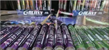  ?? PHOTO/RICHARD VOGEL ?? In this Nov. 11 file photo, pre-rolled marijuana cigarettes are displayed at the Galaxy Company’s booth at the High Times Harvest Cup in San Bernardino. AP