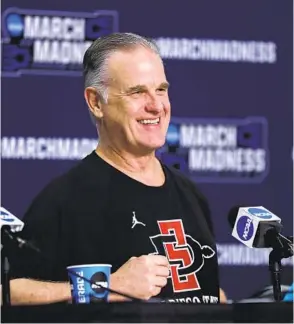  ?? K.C. ALFRED U-T ?? Brian Dutcher is 119-40 as SDSU’S head coach. In Dutcher’s five seasons, the Aztecs have won 20 four times, 30 (30-2) once. But that 0-3 in NCAA Tournament has some fans upset.