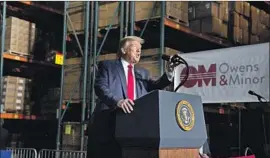  ?? Evan Vucci Associated Press ?? PRESIDENT Trump’s visit to a medical supply company in Pennsylvan­ia is indicative of how he turns trips dealing with the pandemic into quasi-campaign events.