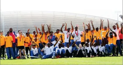  ?? Photo: Hesron Kapanga ?? Success... Namibian athletes with disabiliti­es, coaches and officials pose for a picture at the Green Point stadium after the 2023 Toyota SASAPD National Championsh­ips in Cape Town.