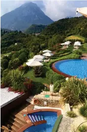  ??  ?? glorious sETTiNg: Pools in the grounds of the utterly sumptuous Lefay Resort and Spa