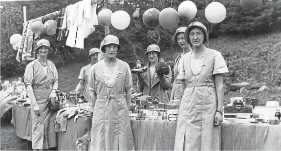  ??  ?? This picture, from 1931, shows a stall at a Girl Guide fundraisin­g event in Arbroath. The splendid line-up comprises, from left Mrs A.I. (Nellie) Swan, Miss Ellis, Mrs May Napier, Mrs Annie Scobie, Miss Isobel Swan (Mrs Sturrock) and Mrs Ruth Farquhar. One of the items for sale is labelled Bospur, which could have been either soup or gravy powder. Also on offer is Cerebos custard powder.