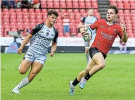  ?? /Gordon Arons/Gallo Images ?? Try time: Quan Horn of the Lions leaves a Dragons player in his wake as he heads for the tryline in Saturday’s match at Ellis Park.