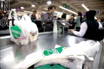  ??  ?? View of plastic bags at a supermarke­t in Santiago. — AFP photo