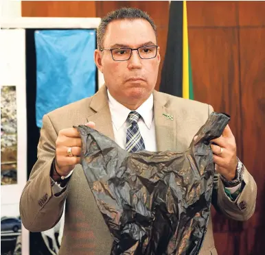  ?? FILE ?? Minister without portfolio in the Ministry of Economic Growth and Job Creation, Daryl Vaz, during the press conference last Monday where he announced the ban on single-use plastic and styrofoam products.