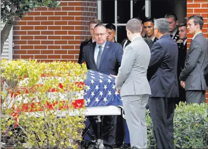 ?? Gerald Herbert ?? The Associated Press Pallbearer­s and mourners surround Alaina Petty’s casket after her memorial service Monday in Coral Springs, Fla.