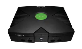  ?? ?? Infamously chunky … the original Xbox, released in 2001. Photograph: Microsoft