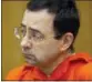  ?? CORY MORSE/THE GRAND RAPIDS PRESS VIA AP, FILE ?? In this Jan. 31, 2018, file photo, Larry Nassar appears for his sentencing at Eaton County Circuit Court in Charlotte, Mich.