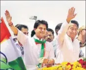  ?? PTI ?? Newly appointed Madhya Pradesh Congress state chief Kamal Nath (right) and chairman of election campaign committee Jyotiradit­ya Scindia during a roadshow in Bhopal on Tuesday.