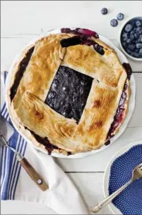  ?? RIKKI SNYDER, NYT ?? A maple blueberry pie made with the award-winning recipe of Paul Arguin.