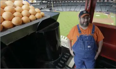  ?? ERIC GAY — THE ASSOCIATED PRESS ?? Bobby Vasquez operates a train in and around Minute Maid Park before Game 4 of the World Series between the Astros and the Dodgers on Oct. 28 in Houston.