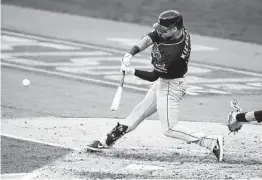  ?? GREGORY BULL AP ?? The Rays’ Kevin Kiermaier hits a three-run home run in the fourth inning Wednesday night at Petco Park to break a 1-1 tie with the Yankees.