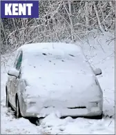  ??  ?? KENT SNOWED IN: A driver is forced to abandon his car outside Maidstone, while motorists in Goathland, above, attempt their own rescue. Below: A crash in Beeley