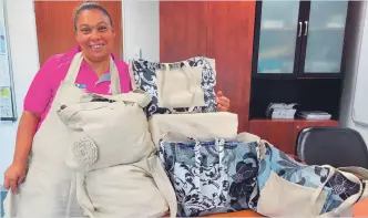  ?? ?? Estelle Fredericks, social auxiliary worker in the Community Developmen­t Services department, with some of the products created by the workgroup that are for sale.