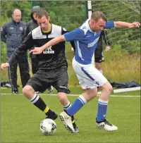  ??  ?? Above: Fort’s Lewis Campbell wins the ball from Andy McKellar.