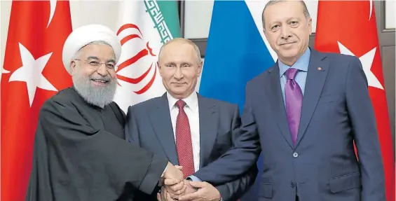  ?? AFP ?? Reunión. El presidente iraní Hassan Rohani; el turco Recep Erdogán; y el ruso Vladimir Putin lograron un principio de acuerdo en Sochi.
