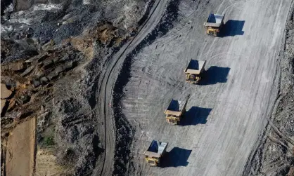  ?? Photograph: Ben Nelms/Bloomberg/Getty ?? Heavy duty mining vehicles at a tar sands mine in Alberta, Canada. The UK’s National Employment Savings Trust is to ban investment­s in companies involved in extracting oil from tar sands.