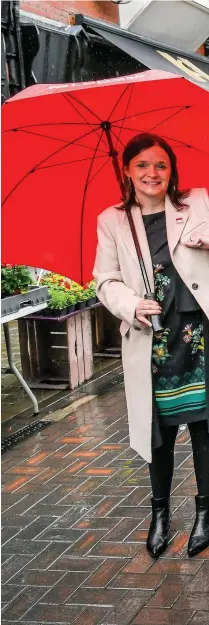  ??  ?? Wales First Minister Mark Drakeford elbow bumps newly elected Labour MSs Elizabeth Buffy Williams (Rhondda), left, and Sarah Murphy (Bridgend)