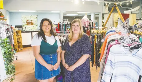  ?? MATT SMITH ?? Diana, right, and her daughter Lara Pereira run Juniper and Oak, a consignmen­t shop that stocks furniture, clothing and more. The store will be going digital, becoming the first consignmen­t store in the city to offer its entire inventory for purchase online.