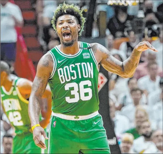  ?? Lynne Sladky The Associated Press ?? Marcus Smart’s return to the lineup in Game 2 (24 points, 12 assists) gave the Celtics a huge boost, allowing them to even up the Eastern Conference finals at 1-1 and give Boston home-court advantage is what has now become a best-of-5 series.