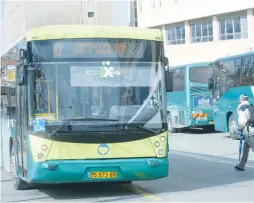  ??  ?? AN EGGED BUS out of service in Jerusalem yesterday.