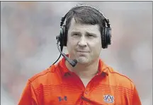  ?? BRYNN ANDERSON/ASSOCIATED PRESS FILES ?? Auburn defensive coordinato­r Will Muschamp is one of the SEC’s 14 new coordinato­rs. In typical SEC style, some have been spare-no-expense hires. Muschamp will make at least $5 million over the next three years.