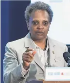  ?? TYLER LARIVIERE/ AP ?? In the first phase of its reopening, Mayor Lori Lightfoot said crowd restrictio­ns will prevent games in Chicago.