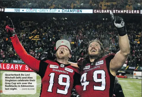  ?? — DAVID BLOOM ?? Quarterbac­k Bo Levi Mitchell (left) and Alex Singleton celebrate their Grey Cup win over the Redblacks in Edmonton last night.