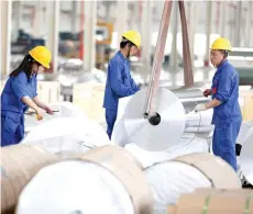  ?? — AFP photo ?? The labour market in Malaysia is expected to strengthen further in 2024, backed by encouragin­g momentum in the domestic economy and recovery in external trade.