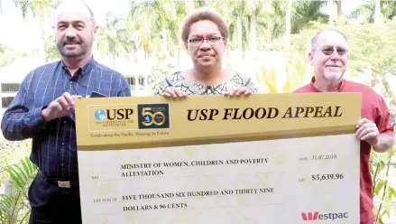  ?? Photo: DEPTFO News ?? From left: Deputy Vice-Chancellor (Learning,Teaching & Student Services) Professor Richard Coll, Minister for Women, Children and Poverty Alleviatio­n Mereseini Vuniwaqa and Group Manager Campus Life, Glenn Pope during the USP Flood Appeal Cheque...