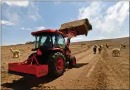  ?? HELEN H. RICHARDSON — THE DENVER POST ?? Under a new law passed by Colorado legislator­s, tractor owners now have the ability to repair their own equipment.