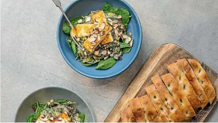  ??  ?? Haloumi with mushroom ragu and focaccia served on the side.