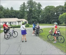  ?? MELISSA SCHUMAN - MEDIANEWS GROUP ?? Tour guide Linda Harvey-Opiteck talks about the history of the State Park at the beginning of the July 11 bike tour.